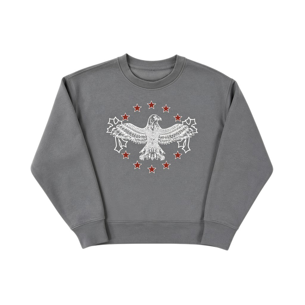 FREE REIN grey crewneck sweatshirt with a white eagle graphic surrounded by red stars. Made from 80% cotton, 20% recycled polyester.
